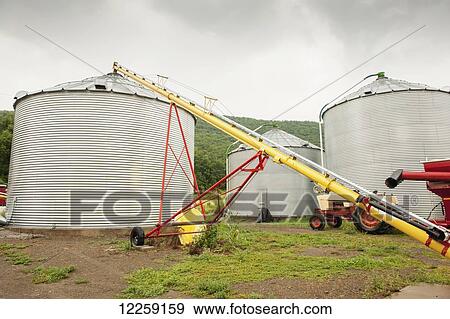 Stock Photo - Grain bins on a farm; Knoxville, Pennsylvania, United States of America. Fotosearch