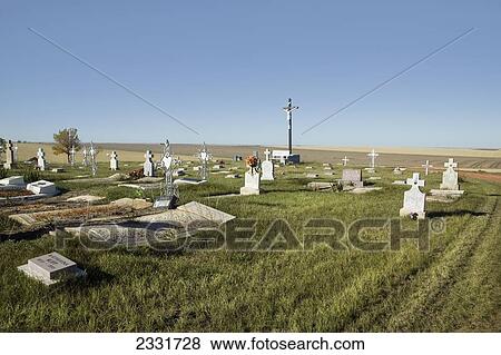 Graves In Catholic Cemetery; Saskatchewan, Canada View Large Photo Image Stock Photo - Graves In Catholic Cemetery; Saskatchewan, Canada. Fotosearch