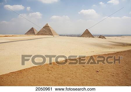 Stock Image - Great Pyramid Of Khufu (Cheops), Pyramid Of Khafre (Chephren) And Pyramid Of Menkaure (Mycerinus), Giza, Al Jizah, Egypt. Fotosearch