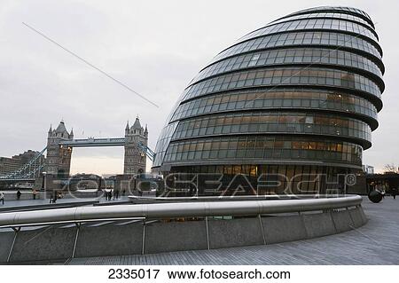Stock Photo - Greater London Council (Glc) Building And Tower Bridge; London, England, Uk. Fotosearch