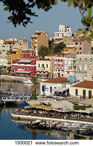 Stock Image - Greece, Crete, Looking across Lake Voulismeni; Agios Nikolaos. Fotosearch
