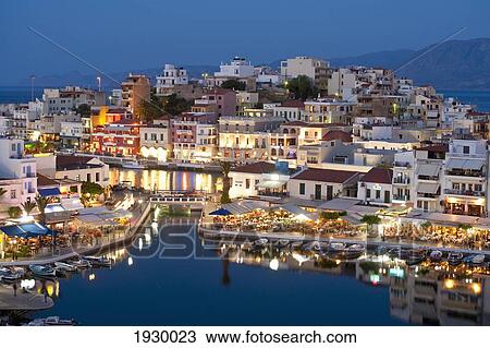Greece, Crete, View of Lake Vouismeni and town at dusk; Agios Nikolaos View Large Photo Image Stock Image - Greece, Crete, View of Lake Vouismeni and town at dusk; Agios Nikolaos. Fotosearch