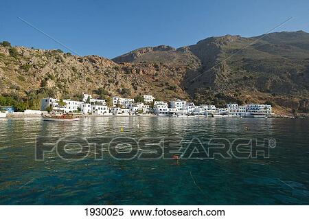 Greece, Crete, View of town from sea; Loutro View Large Photo Image Stock Photography - Greece, Crete, View of town from sea; Loutro. Fotosearch