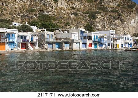 Greece, Cyclades, Island of Milos, Village of Kilma, Houses near shore. View Large Photo Image Stock Image - Greece, Cyclades, Island of Milos, Village of Kilma, Houses near shore.. Fotosearch