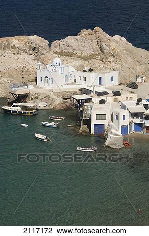 Greece, Cyclades, Island of Milos, Village of Firopotamos, Boats and Buildings near shore. View Large Photo Image Stock Image - Greece, Cyclades, Island of Milos, Village of Firopotamos, Boats and Buildings near shore.. Fotosearch