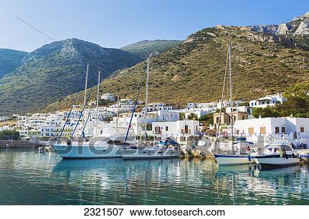 Greece, Greek Islands, Large Yachts Docked In Traditional Greek Harbor View Large Photo Image Stock Photo - Greece, Greek Islands, Large Yachts Docked In Traditional Greek Harbor. Fotosearch