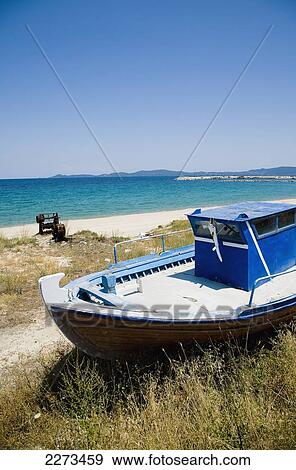 Stock Photo - Greece, Halkidiki, Fishing boat on beach; Ierissos. Fotosearch