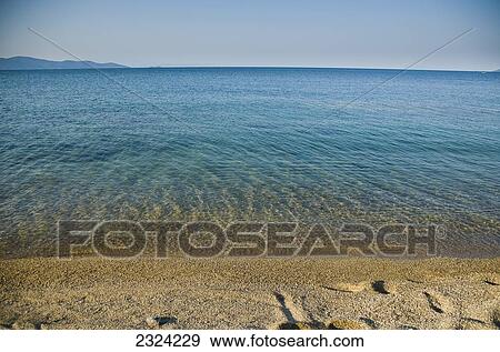 Greece, Halkidiki, Footprints on beach; Ierissos View Large Photo Image Stock Photo - Greece, Halkidiki, Footprints on beach; Ierissos. Fotosearch