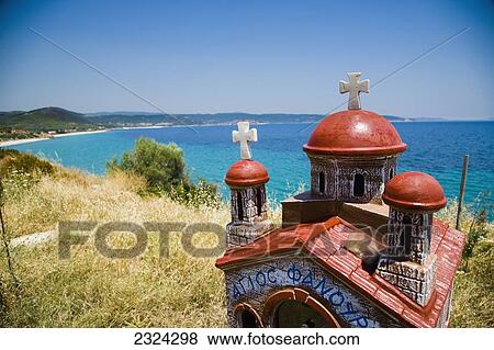 Greece, Halkidiki, Miniature church shrine overlooking Mediterranean sea; Sithonia View Large Photo Image Stock Photo - Greece, Halkidiki, Miniature church shrine overlooking Mediterranean sea; Sithonia. Fotosearch