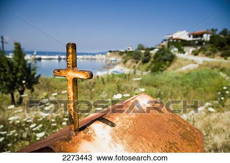 Greece, Halkidiki, Rusty miniature church roadside shrine along coast road and small fishing harbor in the distance; Nea Roda View Large Photo Image Stock Image - Greece, Halkidiki, Rusty miniature church roadside shrine along coast road and small fishing harbor in the distance; Nea Roda. Fotosearch