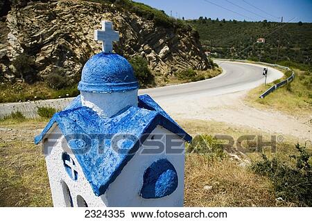 Stock Photography - Greece, Halkidiki, Rusty miniature church roadside shrine; Sithonia. Fotosearch