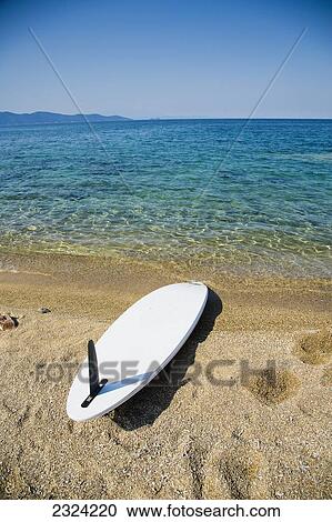 Greece, Halkidiki, Surfboard and foot prints on beach; Ierissos View Large Photo Image Stock Image - Greece, Halkidiki, Surfboard and foot prints on beach; Ierissos. Fotosearch