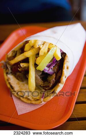 Stock Image - Greece, Halkidiki, Traditional Greek Gyros; Pirgadikia. Fotosearch