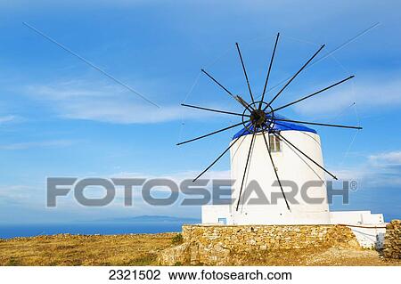 Greece, Santorini, Beautiful Old Windmills With Ocean In Background View Large Photo Image Stock Image - Greece, Santorini, Beautiful Old Windmills With Ocean In Background. Fotosearch