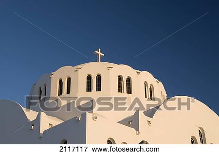 Stock Photo - Greece, Santorini, Fira, Architectural detail of a Greek Orthodox Chrurch and cross.. Fotosearch