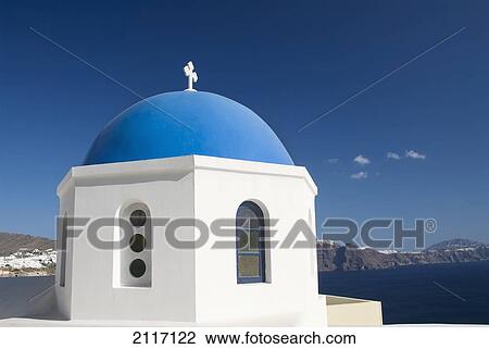 Greece, Santorini, Oia, Architectural detail of Greek Orthodox Chrurch, Island of Thirassia in the distance. View Large Photo Image Stock Image - Greece, Santorini, Oia, Architectural detail of Greek Orthodox Chrurch, Island of Thirassia in the distance.. Fotosearch