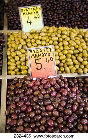 Stock Photograph - Greece, Variety of Greek olives for sale at market stall; Thessaloniki. Fotosearch