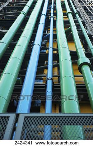 Stock Image - Green and blue pipes; Paris, France. Fotosearch