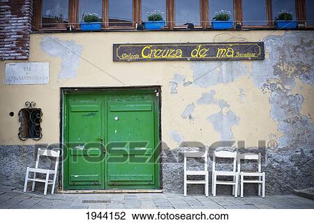 Green Doors And Peeling Paint On A Building; Genoa Liguria Italy View Large Photo Image Stock Image - Green Doors And Peeling Paint On A Building; Genoa Liguria Italy. Fotosearch