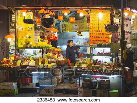 Greengrocer's Shop At Night; Hong Kong, China View Large Photo Image Stock Photo - Greengrocer's Shop At Night; Hong Kong, China. Fotosearch