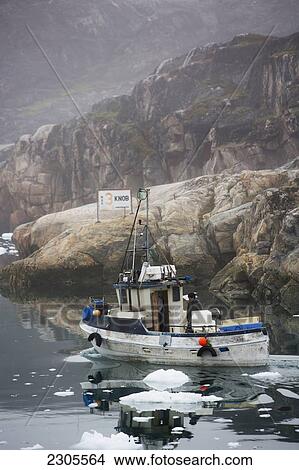 Picture - Greenland, Icefjord; Ilulissat, Fishermen going out to sea at Unesco World Heritage Site. Fotosearch