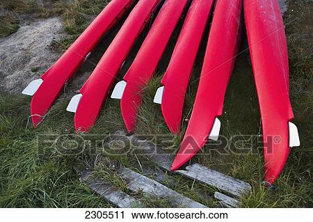 Stock Image - Greenland, Icefjord; Ilulissat (Jakobshavn), Unesco World Heritage Site, Kayaks on shoreline. Fotosearch