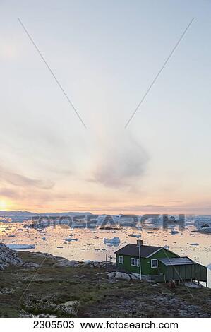 Greenland, Icefjord; Ilulissat, Unesco World Heritage Site, Colorful houses on west coast of Greenland View Large Photo Image Stock Image - Greenland, Icefjord; Ilulissat, Unesco World Heritage Site, Colorful houses on west coast of Greenland. Fotosearch