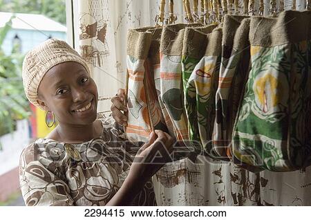 Grenada, Woman at silk screen fashion retail store at St John district; Caribbean View Large Photo Image Stock Photography - Grenada, Woman at silk screen fashion retail store at St John district; Caribbean. Fotosearch