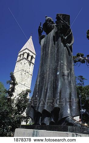 Stock Photo - Grgur Ninski Statue And Diocletian's Palace In The Old Town. Fotosearch