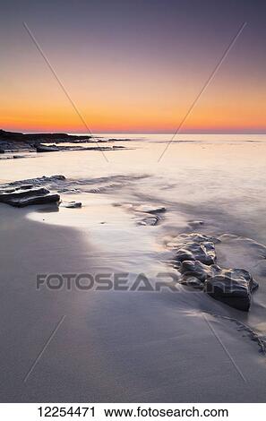 Stock Image - Grobust Beach at dusk; Orkney, Scotland. Fotosearch