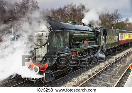 Grosmont, North Yorkshire, England; Steam From A Train Along The Tracks View Large Photo Image Stock Photo - Grosmont, North Yorkshire, England; Steam From A Train Along The Tracks. Fotosearch