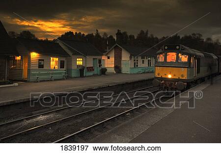 Grosmont Train Station At Dusk; North Yorkshire, England, Uk View Large Photo Image Stock Photo - Grosmont Train Station At Dusk; North Yorkshire, England, Uk. Fotosearch