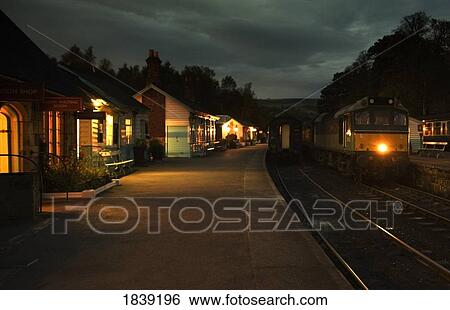Grosmont Train Station At Dusk; North Yorkshire, England, Uk View Large Photo Image Stock Photograph - Grosmont Train Station At Dusk; North Yorkshire, England, Uk. Fotosearch