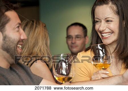 Group Of Friends Having Drinks, Toronto, Ontario View Large Photo Image Stock Photo - Group Of Friends Having Drinks, Toronto, Ontario. Fotosearch