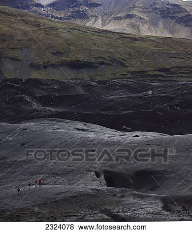 Stock Photo - Group of people hiking on the Vatnajokull ice cap in southern Iceland; Iceland. Fotosearch