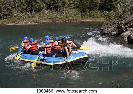 Stock Photograph - Group Of Rafters On A River; Alberta, Canada. Fotosearch