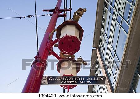 Stock Photo - Guangzhou Alley Street Sign And Chinese Lamps In Chinatown, Vancouver, British Columbia, Canada. Fotosearch