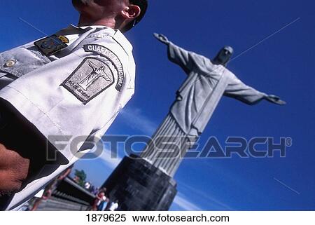 Stock Photography - Guard And Corcovado Christ The Redeemer. Fotosearch