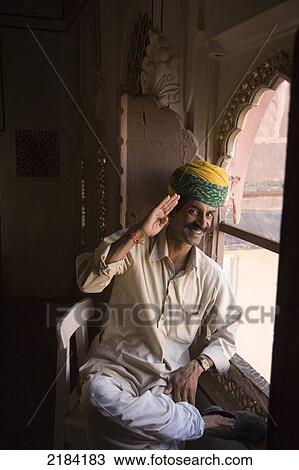 Stock Image - Guard, Meherangarh Fort, Jodpur, Rajasthan, India. Fotosearch