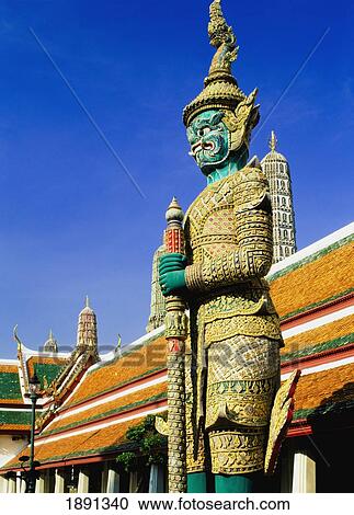 Stock Image - Guardian Statue At Grand Palace. Fotosearch