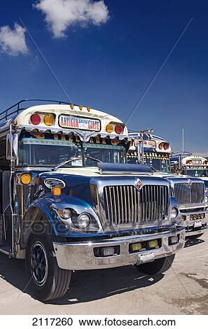 Stock Image - Guatemala, Antigua, the colorful chicken bus of Guatemala. Fotosearch