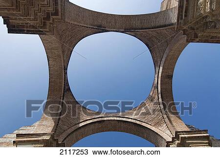 Stock Image - Guatemala, Antigua, the ruined interior of the Cathedral of San Jose. Fotosearch