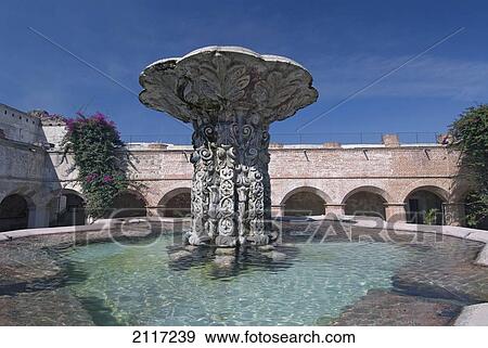 Stock Photo - Guatemala, Antigua, the ruined cloisters and gardens of Church and Convent de Nuestra Senora of La Merced. Fotosearch