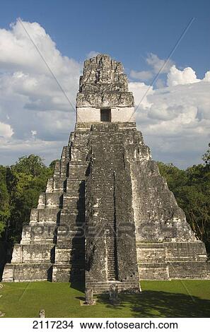 Picture - Guatemala, Peten, Tikal National Park, Jaguar Temple at the great plaza.. Fotosearch