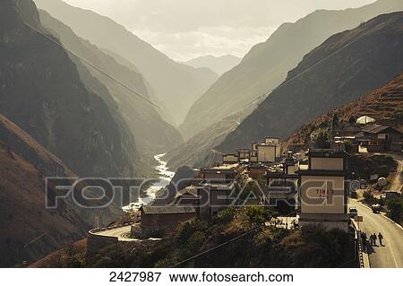 Guesthouse and valley, Tiger Leaping Gorge; Lijiang, Yunnan Province, China View Large Photo Image Stock Photo - Guesthouse and valley, Tiger Leaping Gorge; Lijiang, Yunnan Province, China. Fotosearch