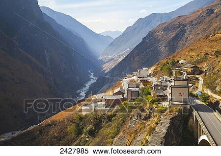 Guesthouse and valley, Tiger Leaping Gorge; Lijiang, Yunnan Province, China View Large Photo Image Stock Photography - Guesthouse and valley, Tiger Leaping Gorge; Lijiang, Yunnan Province, China. Fotosearch