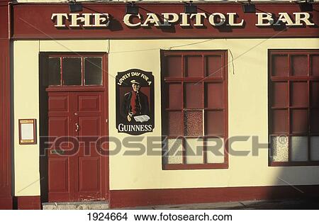 Picture - Guinness Ad On Wall Of The Capitol Bar Pub, Cashel. Fotosearch