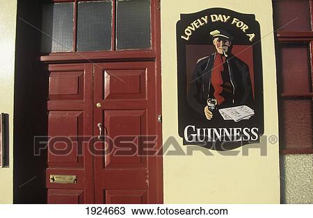 Stock Image - Guinness Ad On Wall Of The Capitol Bar Pub, Cashel. Fotosearch