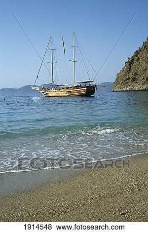 Stock Photo - Gulet Boat At Olympos Beach. Fotosearch