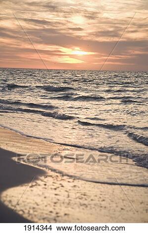 Picture - Gulf Coast Surf At Sunset. Fotosearch